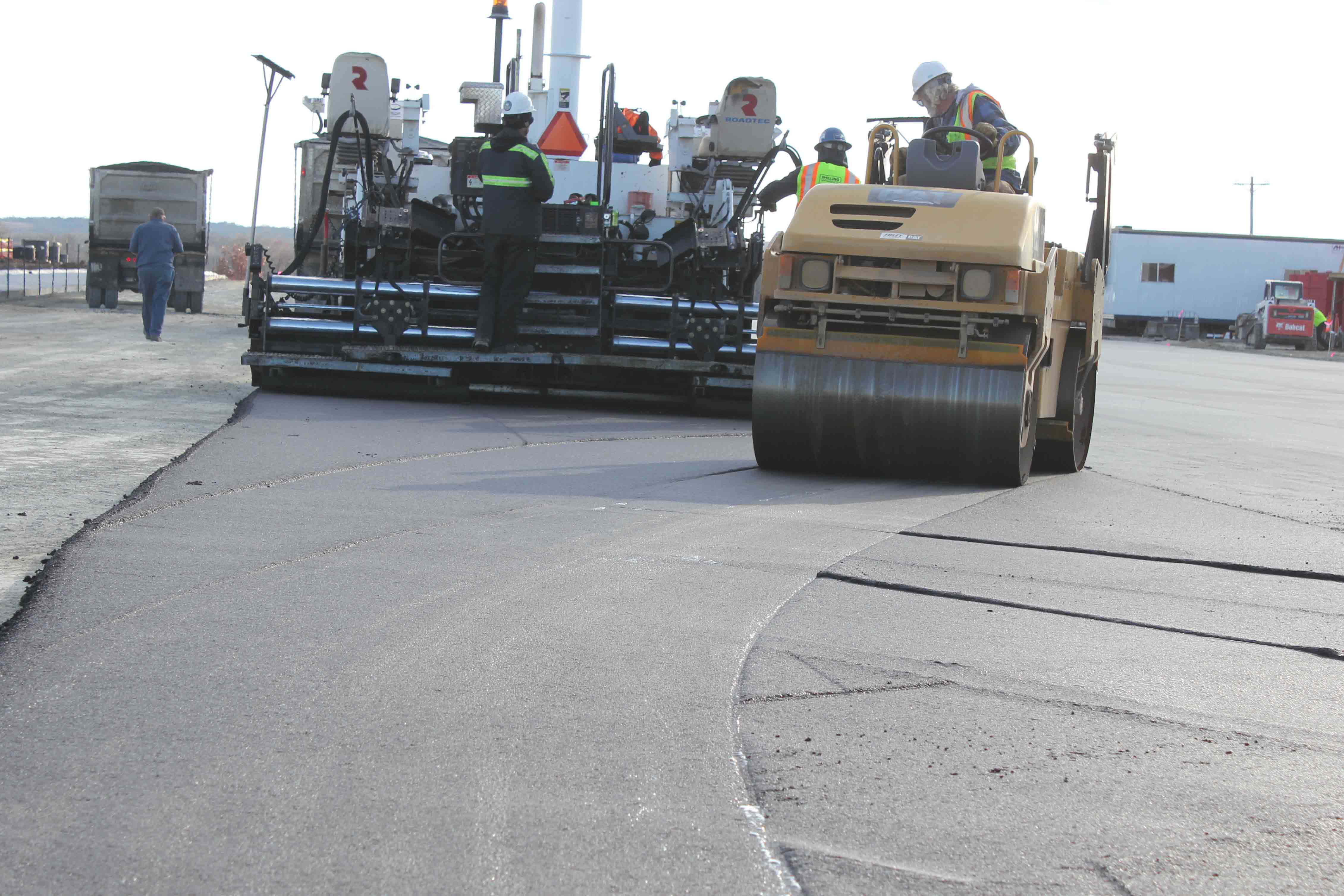 Shilling equipment rolling on asphalt