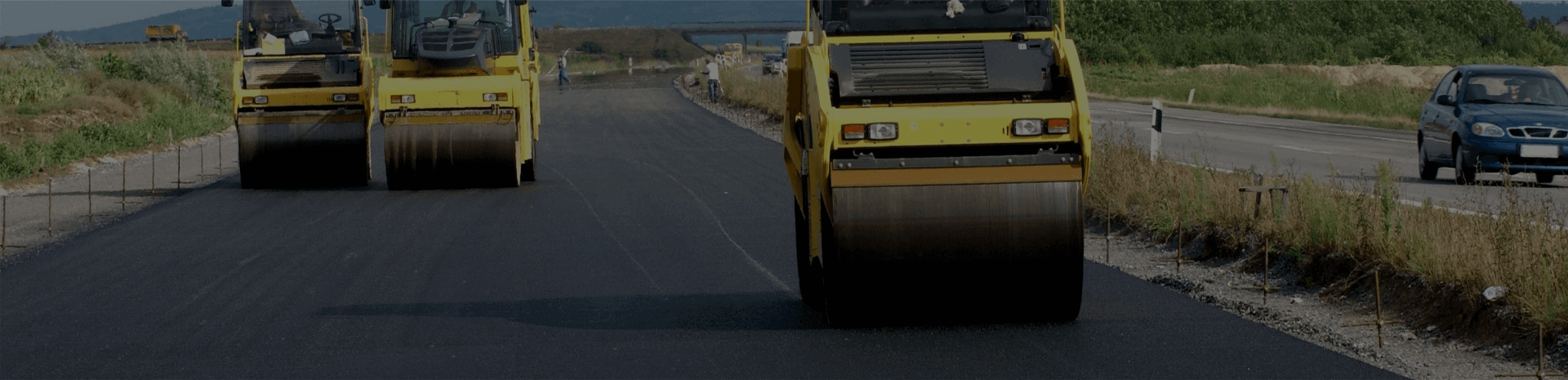 steam rollers pressing road